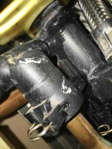 image of a leaking boiler that needs repaired by Letsgo TNT Gas